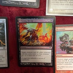 17 Assorted Magic the Gathering cards shown in photo.